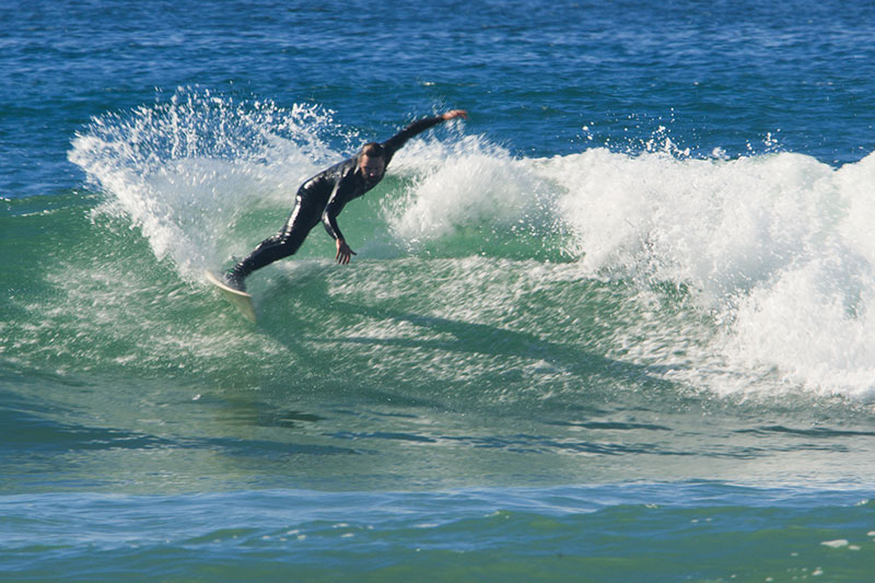 Surfer Riding a Wave